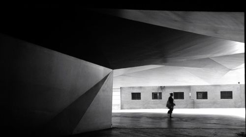 Woman standing in front of building