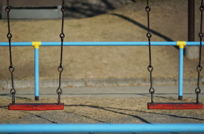 Park playground equipment bars and swings