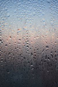 Condensation on the clear glass window. water drops. rain. abstract background texture