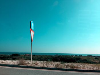 View of sea against clear blue sky