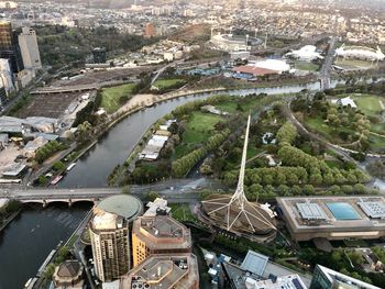 High angle view of river amidst buildings in city