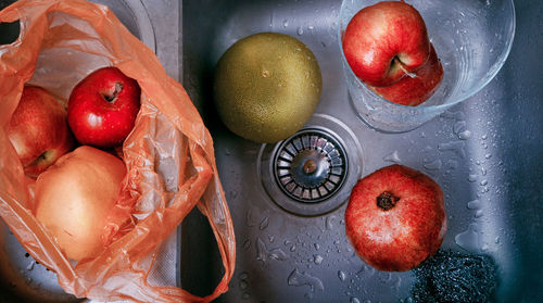 High angle view of apples in container