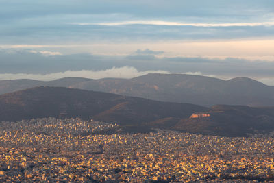 View of athens and aigaleo mountain from lycabettus hill at sunset.