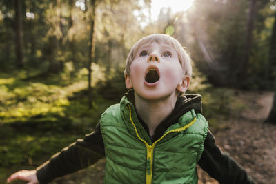 Portrait of boy looking up