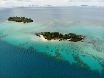 High angle view of island amidst sea