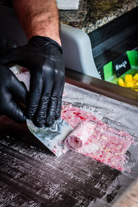 Midsection of man preparing food