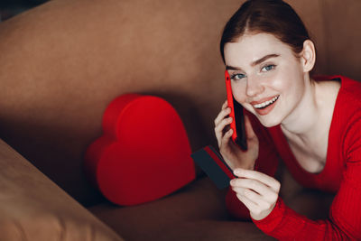 Portrait of smiling young woman