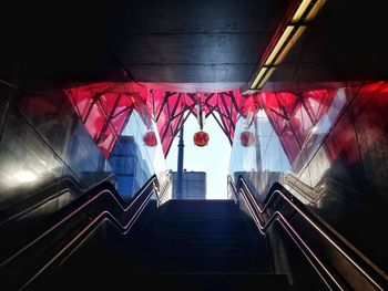 Stairs in illuminated underground walkway