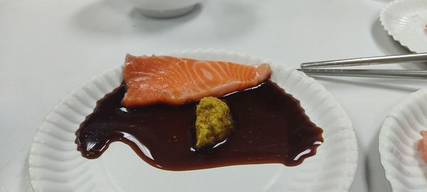 High angle view of fish in plate on table