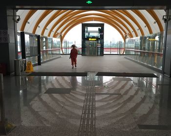 Man walking at railroad station