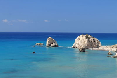 Scenic view of sea against blue sky