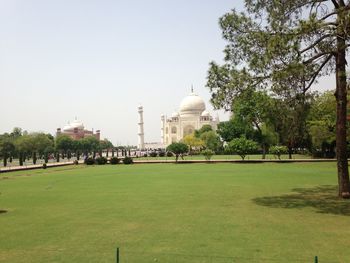 View of monument in city against clear sky