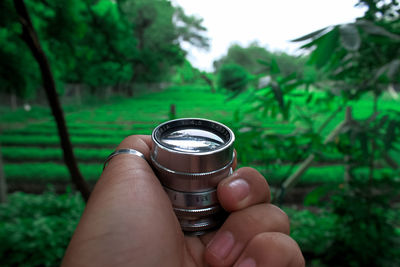 Midsection of person holding drink