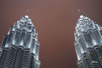 Low angle view of modern buildings against sky