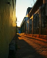 Alley amidst buildings in city