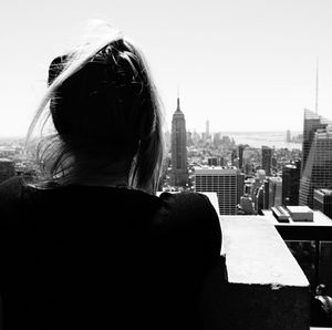 Woman standing in city