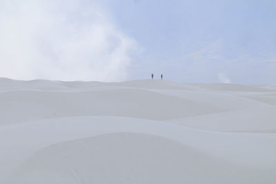 Scenic view of white sand dunes