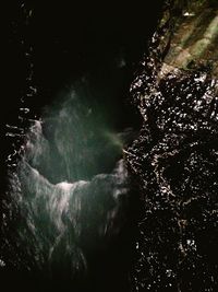 Close-up of waterfall in forest