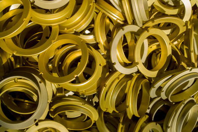 A batch of sulfur oxidated anodized aluminium parts.