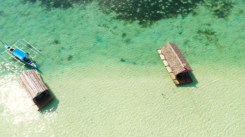 High angle view of ship moored on sea shore