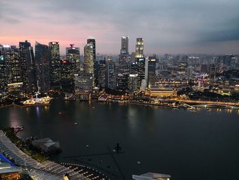 Aerial view of city lit up at night