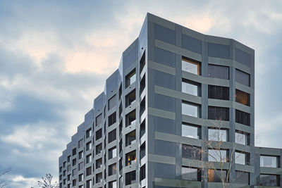 Low angle view of modern building against sky