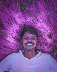 Portrait of young man smiling