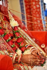Close up of woman with red umbrella