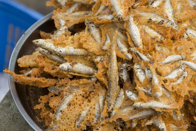 Close-up of fried fish for sale in market