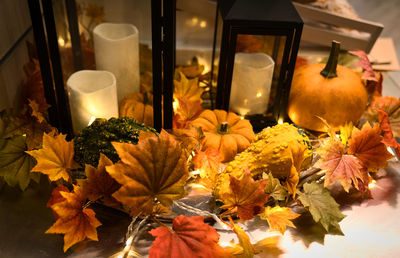 Close-up of orange leaves on table