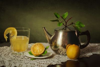 Fruits and tea on table