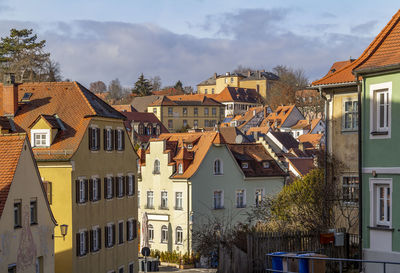 Buildings in city against sky