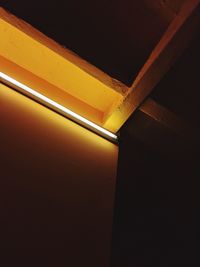 High angle view of illuminated lighting equipment on wall
