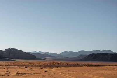 Scenic view of desert against clear sky