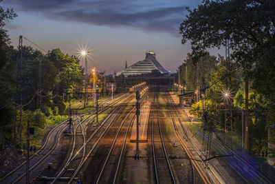High angle view of railroad junction at dusk