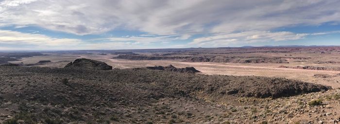 Scenic view of desert against sky