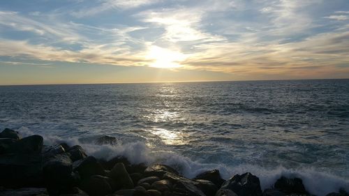 Scenic view of sea at sunset