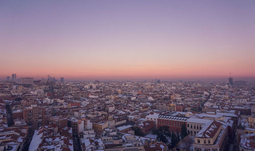 High angle view of cityscape against sky during sunset