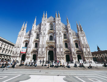 Group of people in front of building