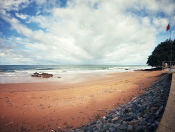 Scenic view of beach against sky