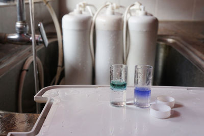 Close-up of glasses on table