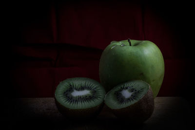 Close-up of fruit against black background