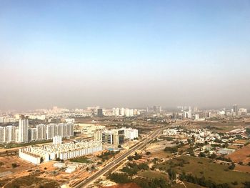 High angle view of buildings against clear sky