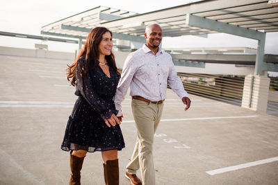 Full length of young couple walking outdoors