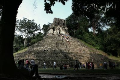 Group of people in front of historical building
