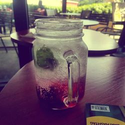 Close-up of beer glass on table