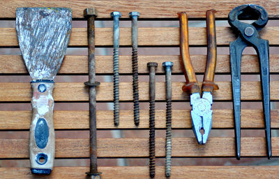 Close-up of clothes hanging on wood