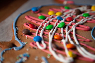 High angle view of multi colored candies on table