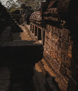 View of old temple against building