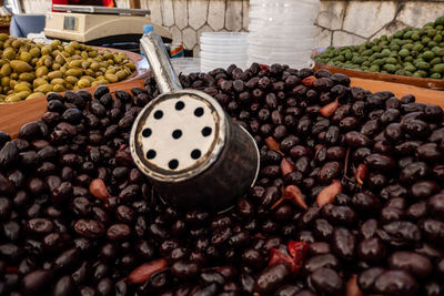 Fruits in basket for sale at market stall